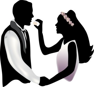 Bride Feeding Cake to Groom