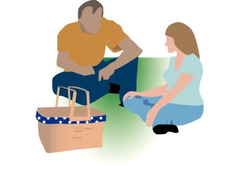 Couple Sits Down for a Summer Picnic