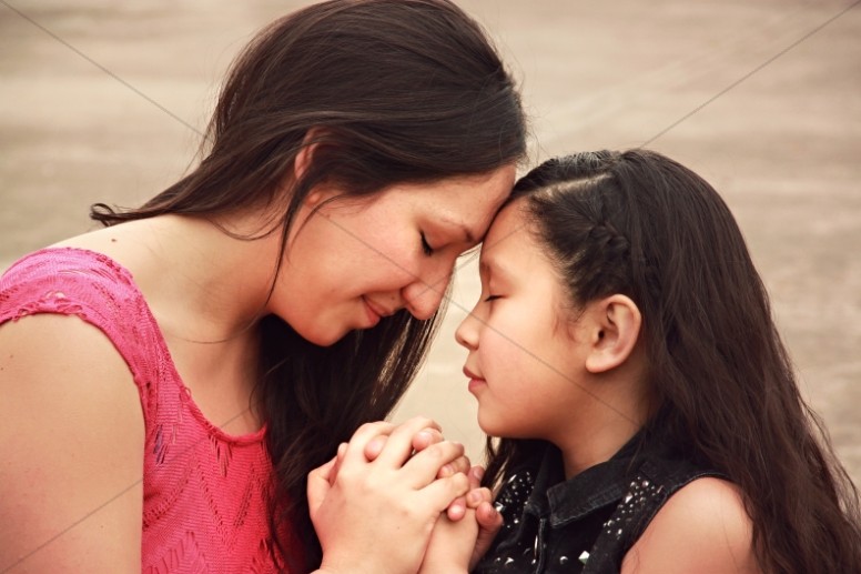 Mother and Daughter in Prayer Ministry Stock Photo Thumbnail Showcase