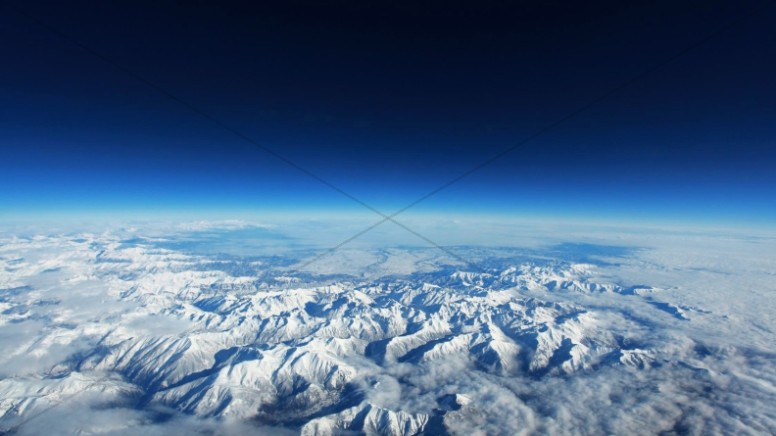 Snowy Mountains from Space Religious Stock Photo Thumbnail Showcase